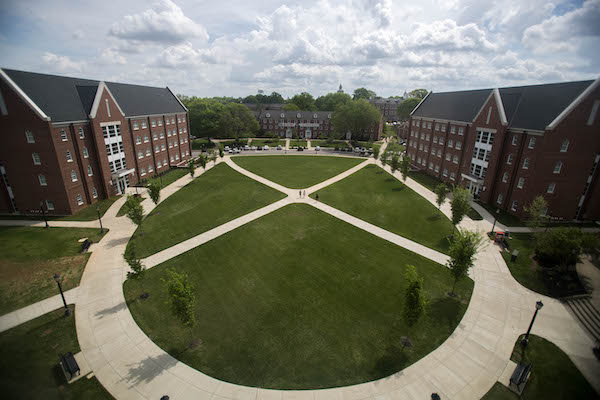 An aerial shot of the housing quad at APSU, with residence halls surrounding a green quad.