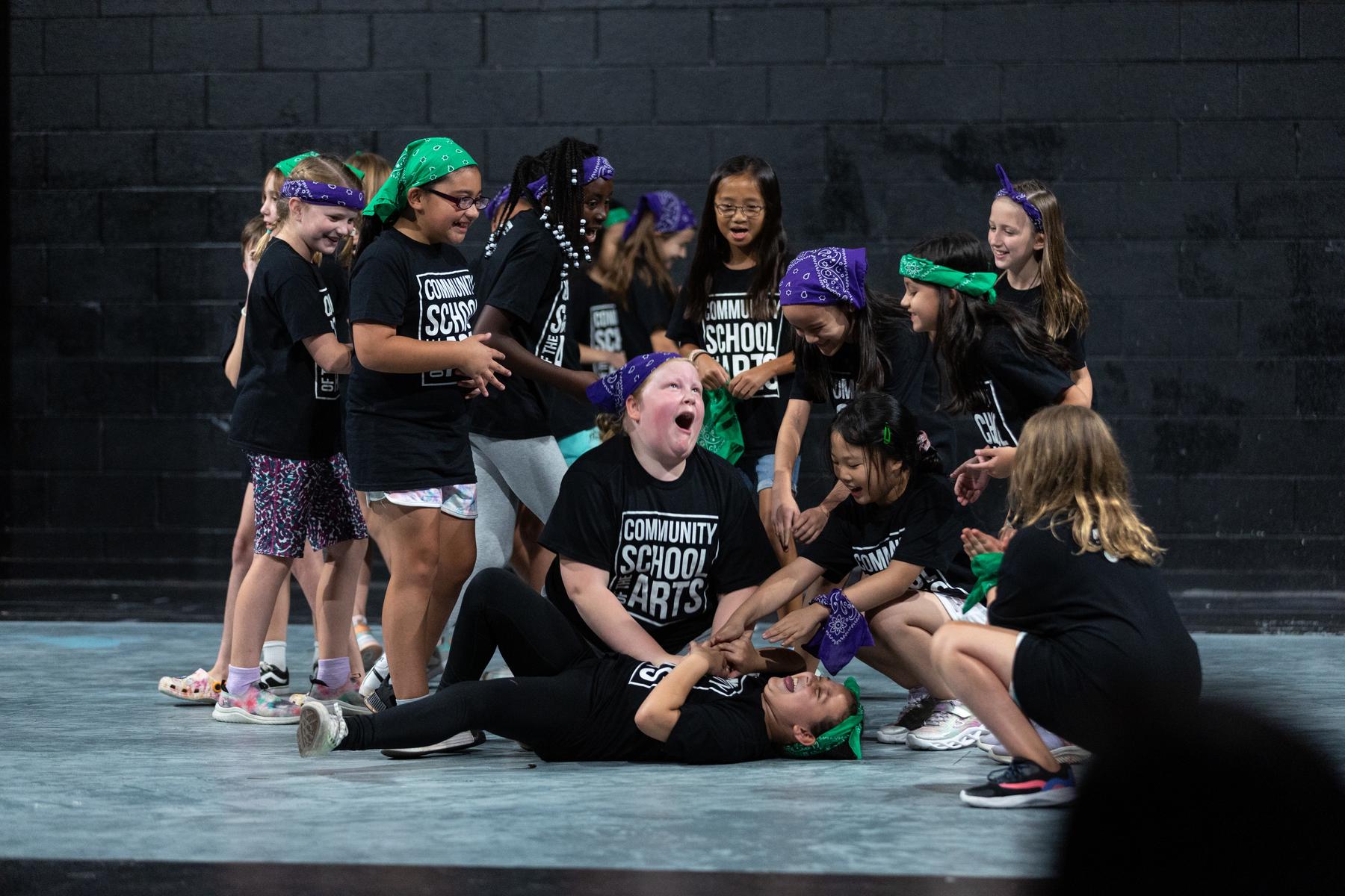 Children perform an improvisational scene at Trahern Theatre during CSA Summer Arts Camp. 