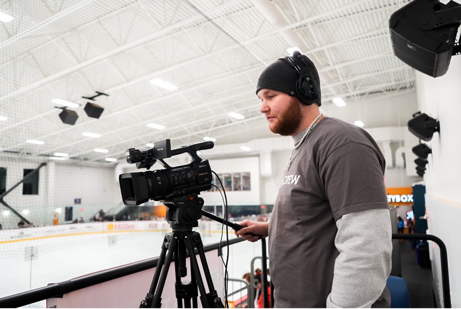Lucas Bales runs camera for Govs Hockey at the Ford Ice Center at F&M Bank Arena.