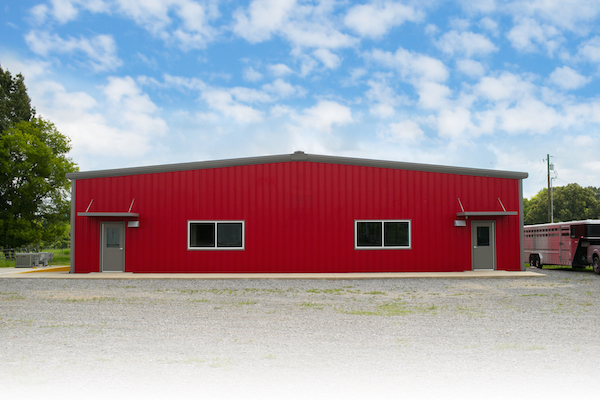 The red exterior of the newly named Brock Blick Building.