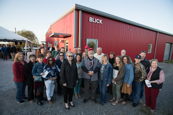 The Blick family joins APSU President Alisa White for a ribbon-cutting ceremony at the APSU farm.