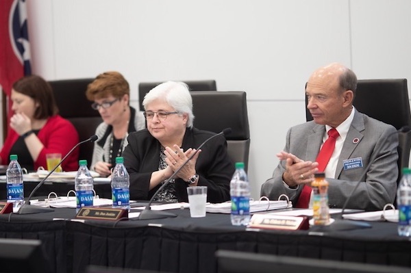 Members of the Board of Trustees meet during a recent meeting. 