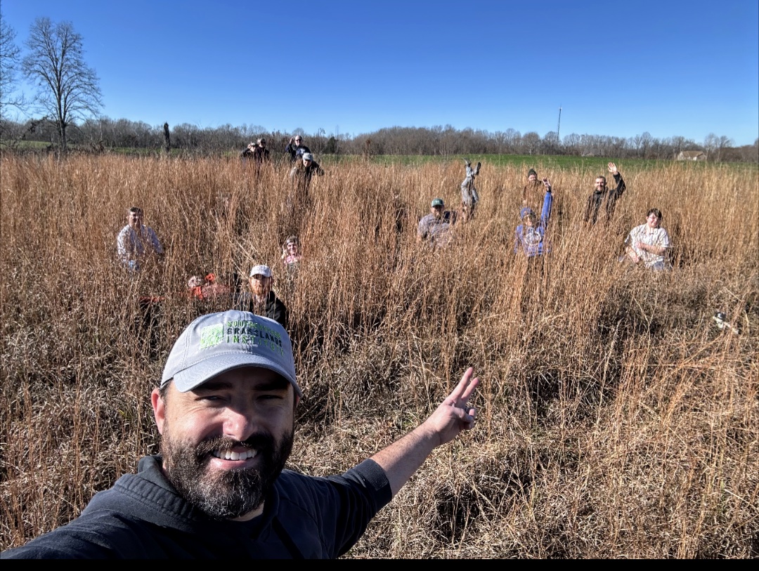 Dr. Dwayne Estes, executive director of the Southeastern Grasslands Institute and professor of biology at Austin Peay State University, works in the field with his students.