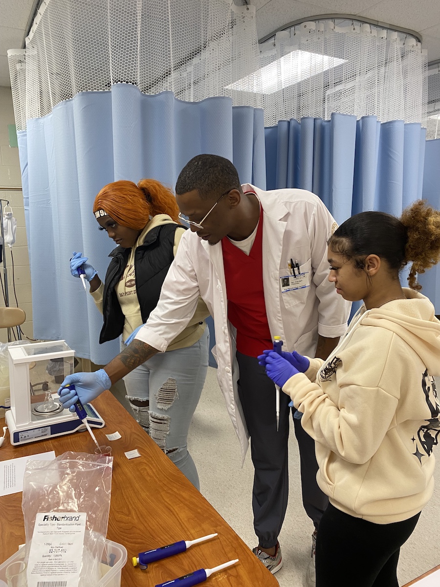 Local high school students gain hands-on experience with medical laboratory science.