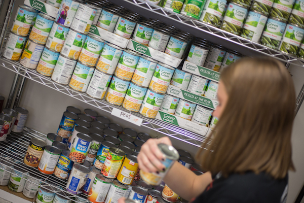 The APSU Food Pantry is stocked with cans.