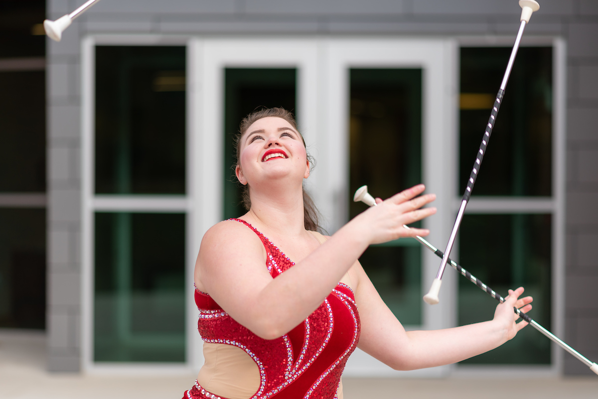 Izzy Melvin is the feature twirler for the Governors' Own Marching Band at Austin Peay.