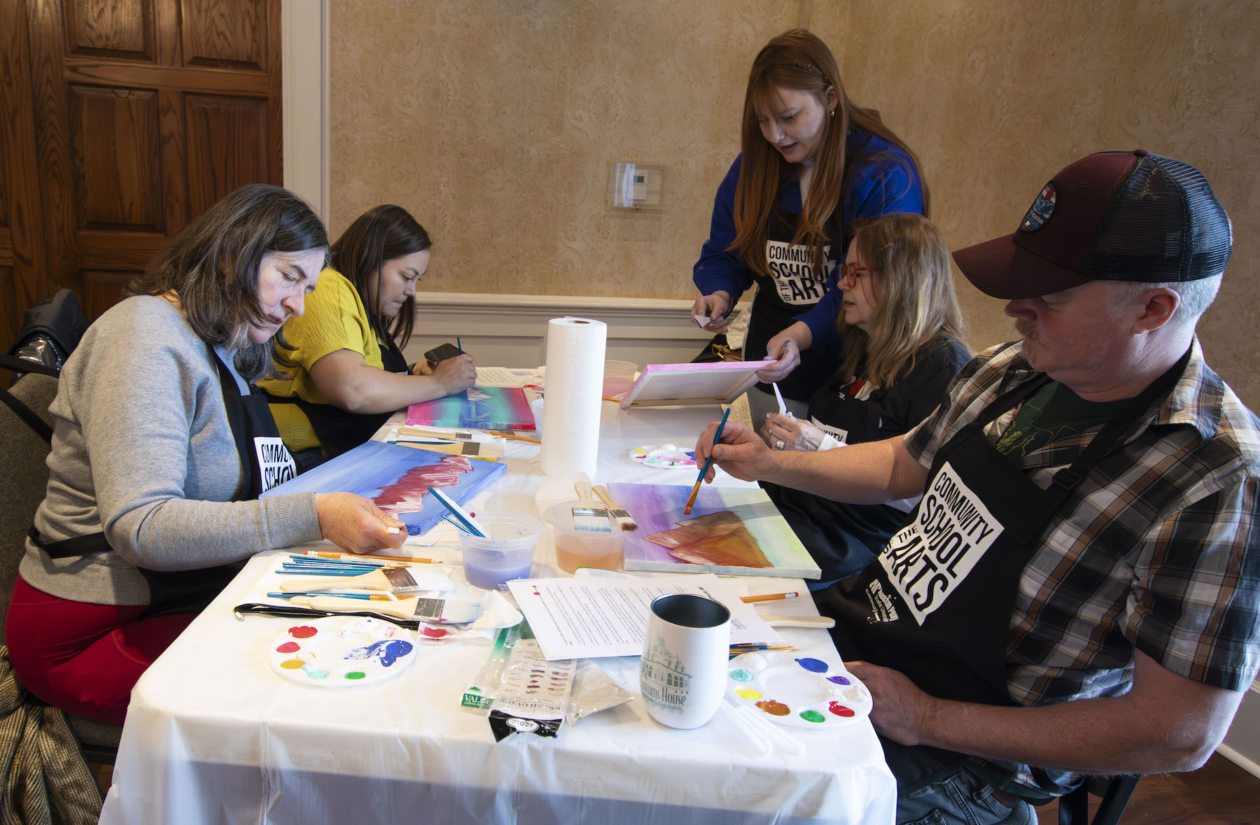 APSU alumna and local artist Sarah Spillers leads a free painting workshop at the Customs House Museum. 