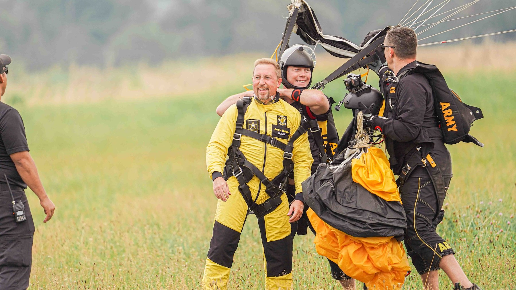 Dr. Chad Brooks, dean of APSU’s College of Graduate Studies, lands after a tandem jump with the United States Army Parachute Team. 