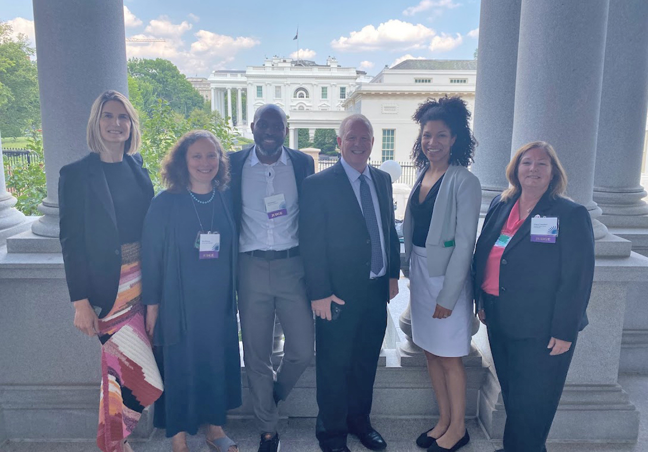 Dr. Cheryl Lambert, far right, with other Rural Tech Project judges and facilitators at the Eisenhower Executive Office Building in Washington, D.C.