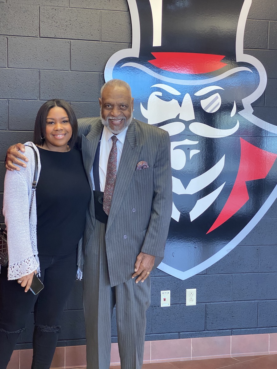 Jzsade Davenport with her grandfather, L.M. Ellis.