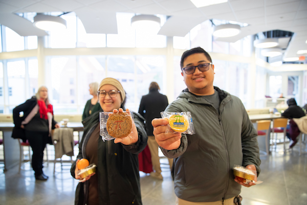 Students from Austin Peay State University's College of Science, Engineering, Mathematics and Technology enjoy oatmeal and banana moon pies March 14 at the Maynard Mathematics and Computer Science Building during a Pi Day celebration. 