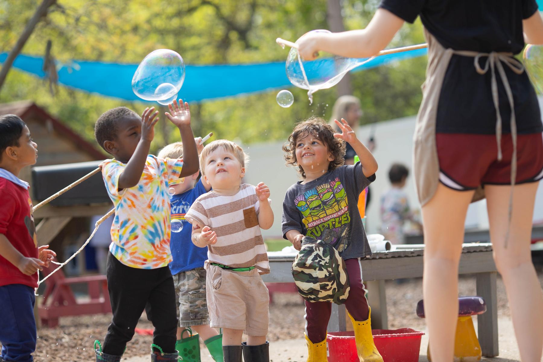 Children enjoy the outdoor play space at the Little Govs Child Learning Center. 