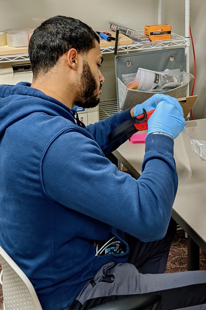 Elijah Henderson tests a mask at the APSU GIS Center in Clarksville, Tennessee.