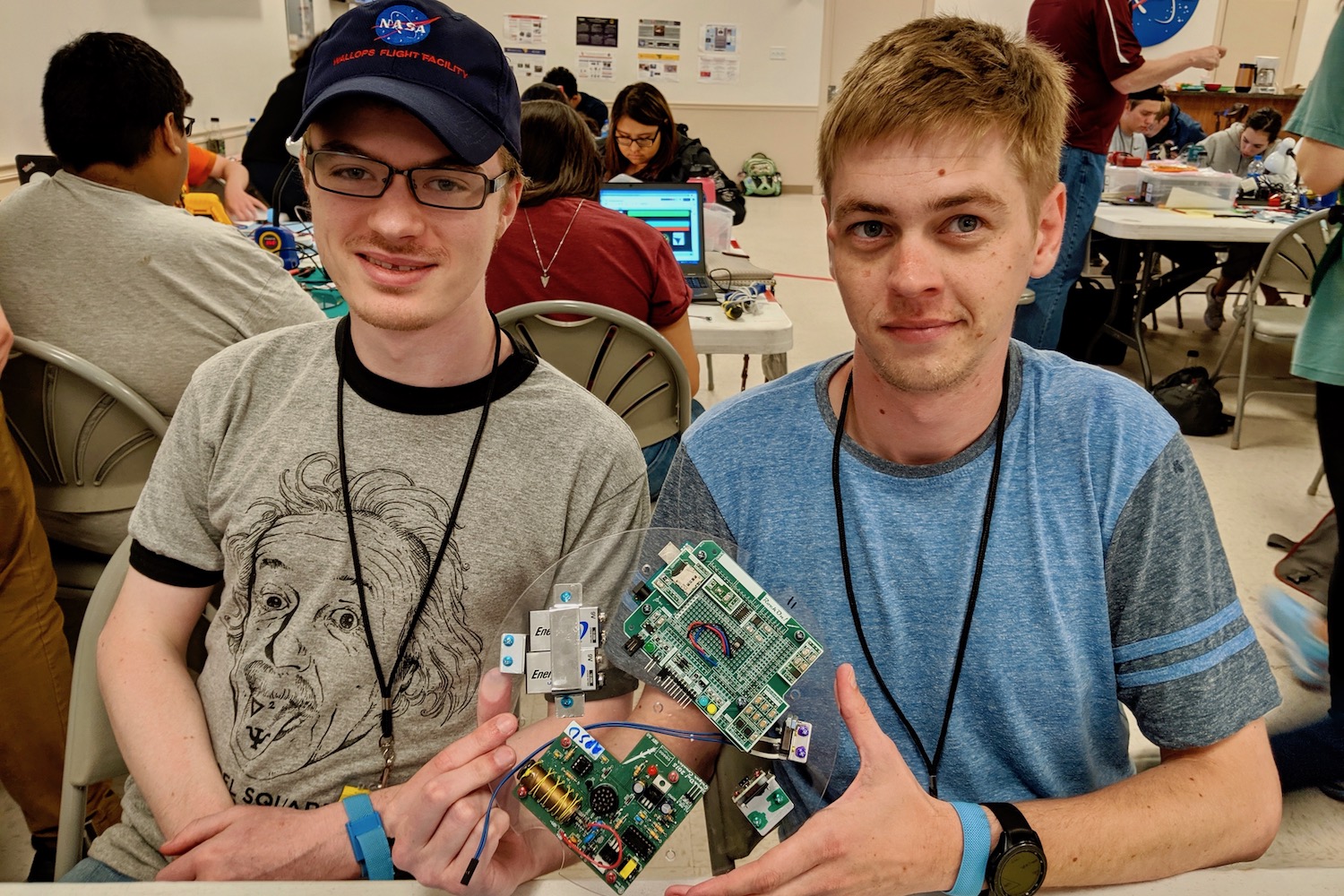 Zach Hill, left, and Zach Givens show off some of their work during Rocket Week at NASA’s Wallops Flight Facility in Virginia.