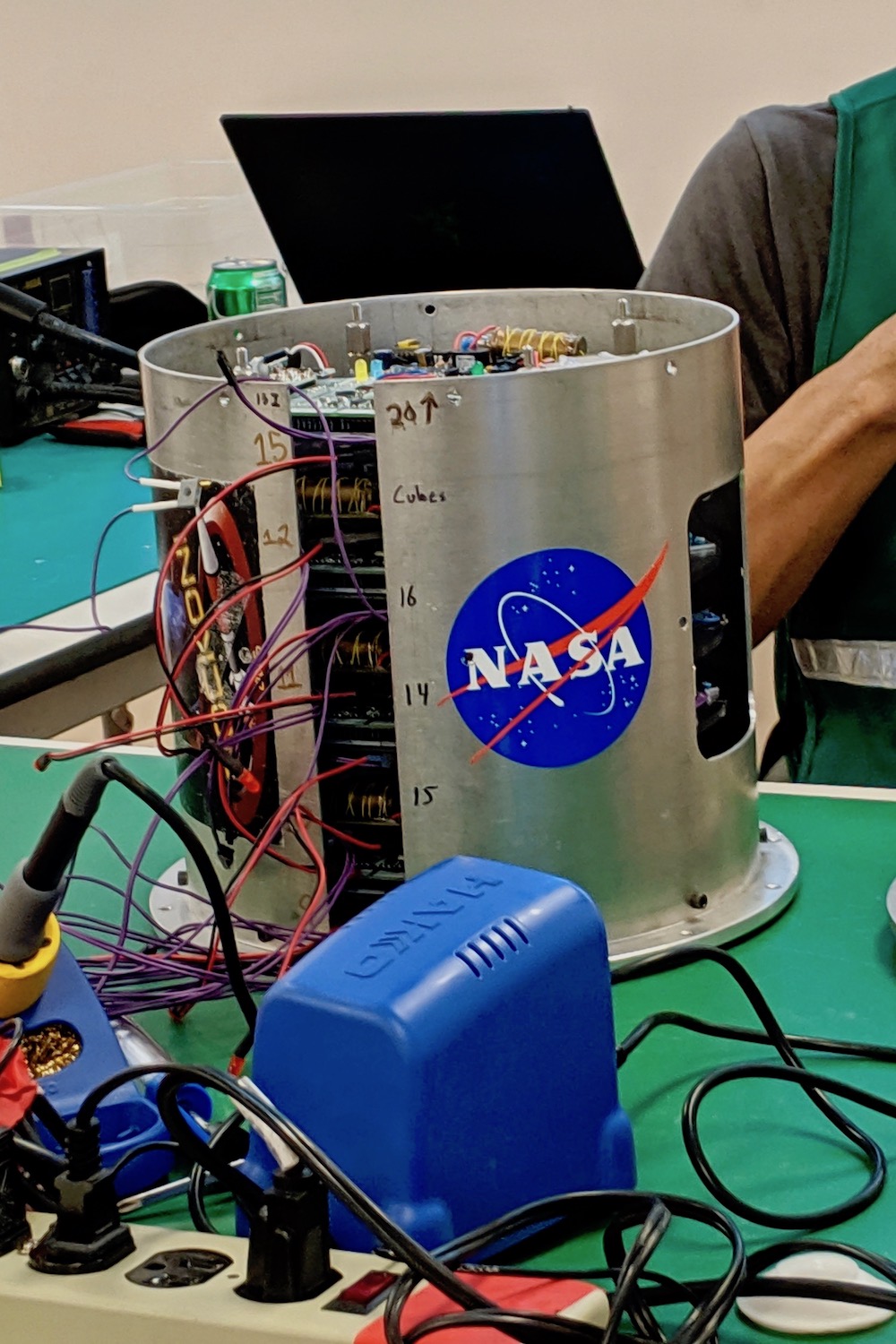 Oelgoetz, Hill and Givens’ experiment awaits inspection during Rocket Week at NASA’s Wallops Flight Facility in Virginia.