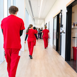 Nursing Students walking down a hallway