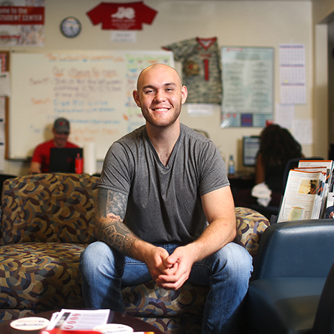 Mental health counseling student sits in Newton Military Family Resource Center