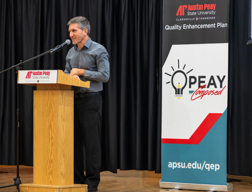 Dr. Melzer presenting at symposium.