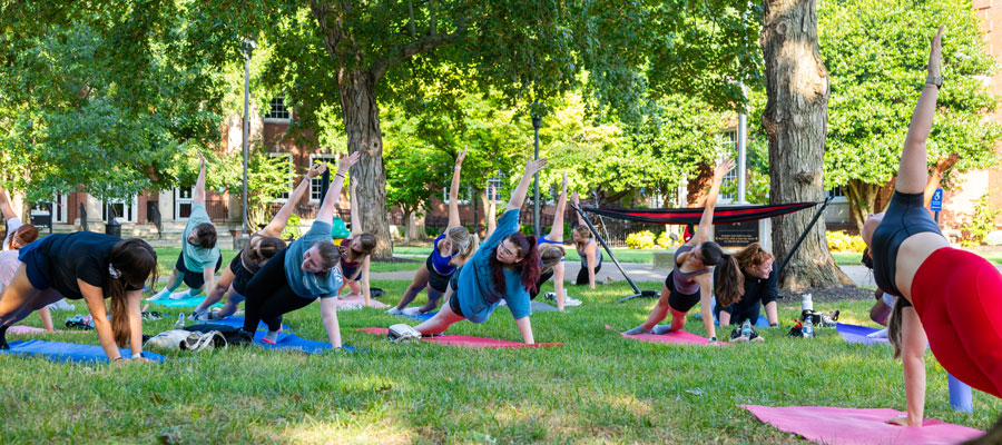 Students participating in Peayceful Yoga