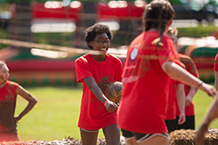 Students play mudbowl in Dunn Center bowl