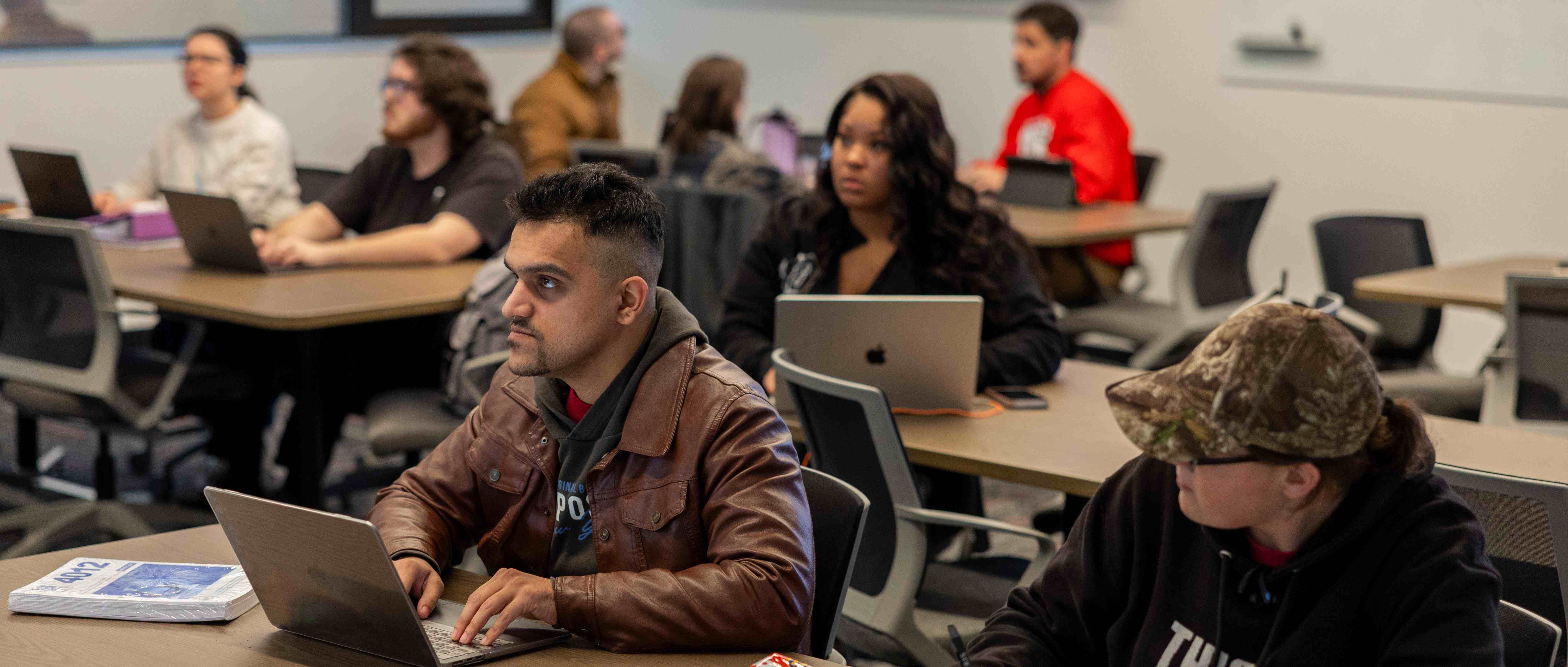 Students sitting in class Header Image: Students sitting in a class
