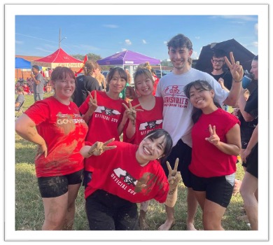 international students at mud bowl